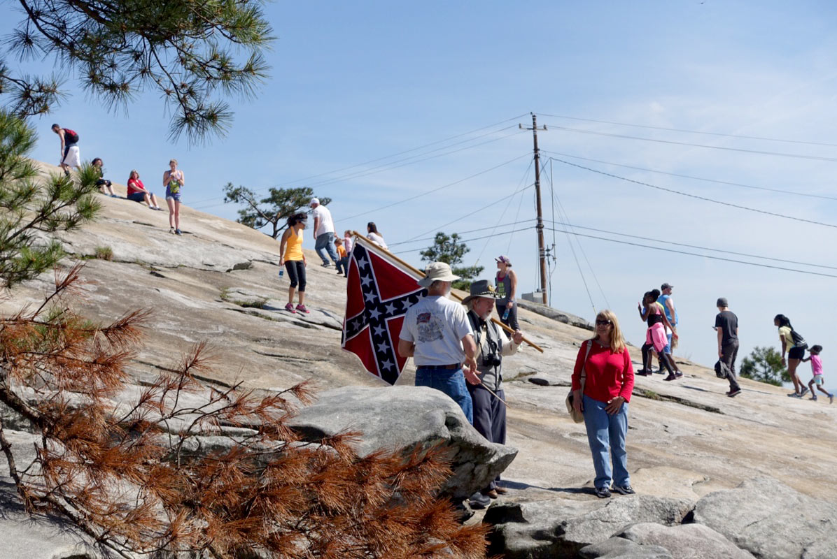 Men with confederate flag on Stone Mountain